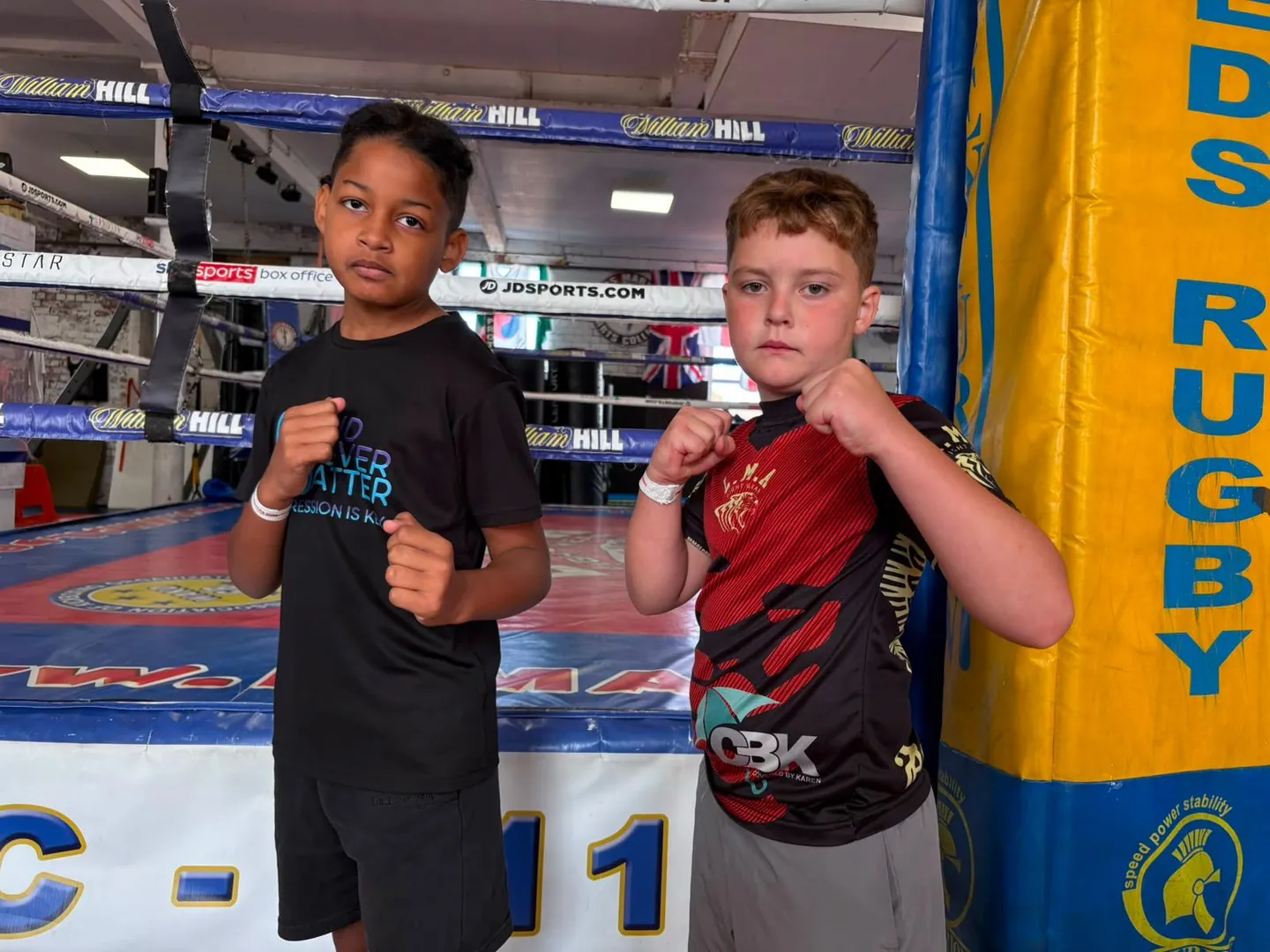 Young competitors by the boxing ring at the previous interclub